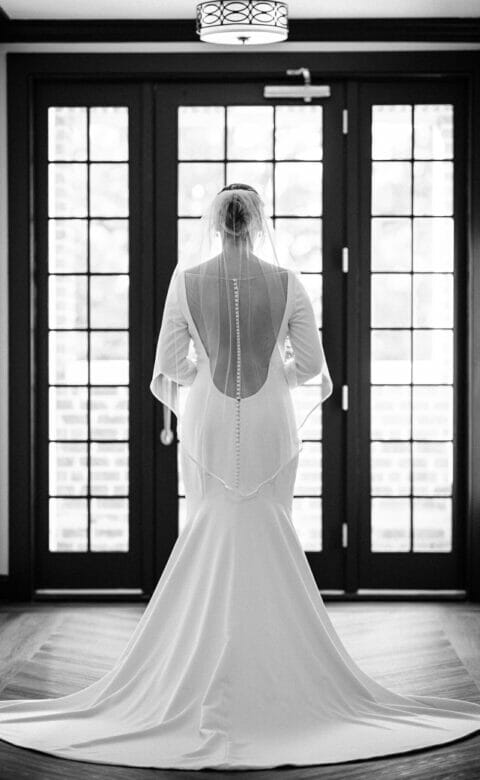 back view of woman in wedding gown